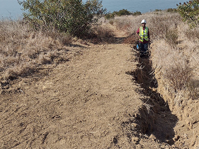 the Malibu Pacific Trail before restoration, showing a deep erosion trench