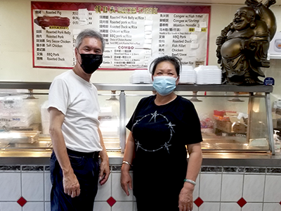 CuiLing Qiu (right) owner of Ling Ling BBQ Fast Food in Downtown L.A.'s Chinatown