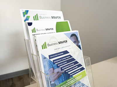 collection of Southeast Los Angeles BusinessSource Center flyers at the newly opened location