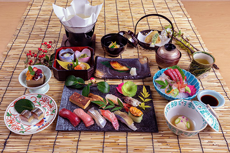 presentation of Eigikutei restaurant's Nabe Kaiseki and Sushi Kaiseki, a traditional Japanese hotpot and a delicate, multi-course sushi meal