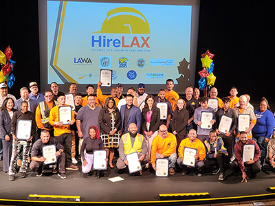 Graduates of the 2023 fall HireLAX Construction Career Training Program pose with their City of Los Angeles completion certificates at the cohort culmination ceremony on October 20, 2023