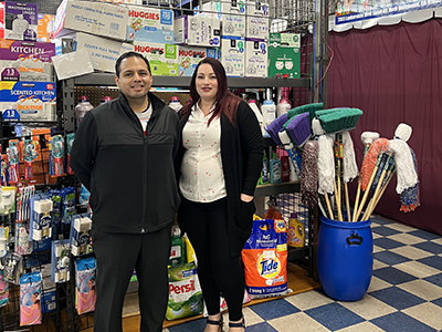 (left to right) South Valley BSC Program Manager Luis Luna and Mirsa Garza, the owner of J&M Discount Store