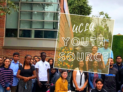 UCLA YouthSource Center participants pose on campus quad with center name overlaid in hollow letters
