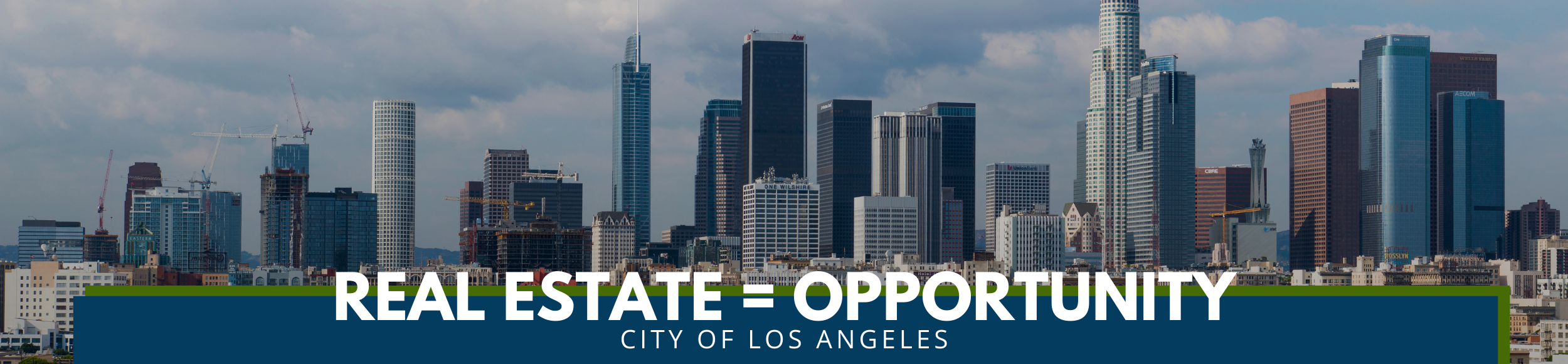 Northwest view of the downtown L.A. skyline with text: Real Estate equals Opportunity with the City of Los Angeles