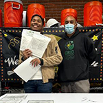 LA:RISE participant Manuel (left) received specialized training for a career in the solar industry