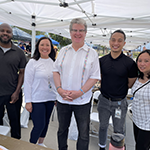 LA City Councilmember Tim McOsker (CD 15) at the Job Resource Fair featured in Juneteenth 400’s annual Juneteenth Celebration (pictured above center with EWDD staff members Aron Thompson and Elisa Lam on the left and Harbor Gateway WSC staff Peter Phou and Jennifer Angeles Weyh on the right)
